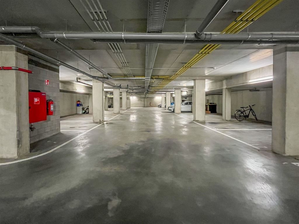 Ondergrondse staanplaats in centrum Herent! foto 3