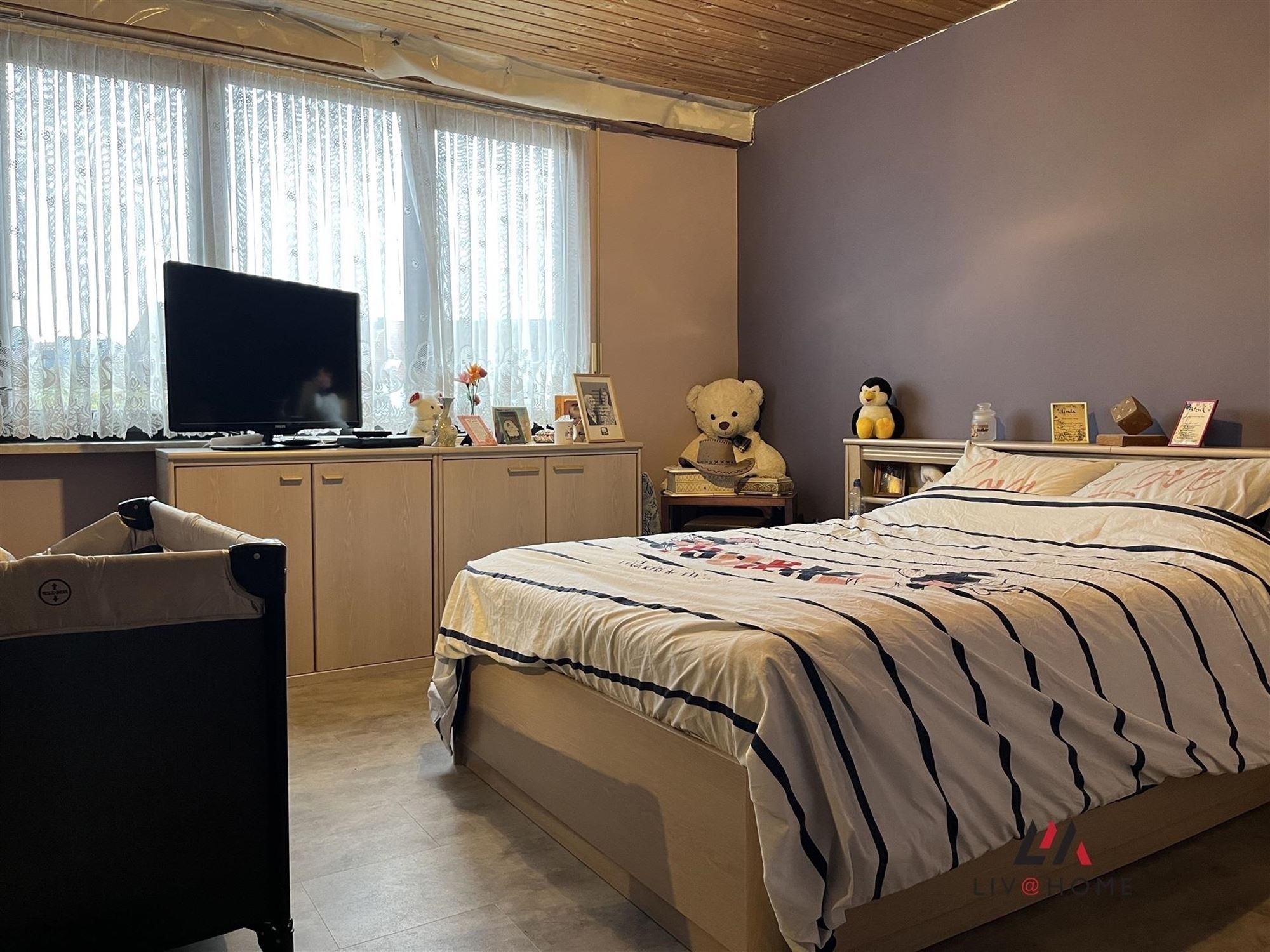 2 aangrenzende rijwoningen met gemeenschappelijke tuin foto 16
