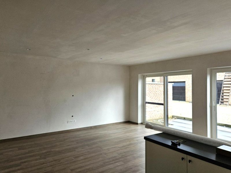 Nieuwbouw, gelijkvloers appartement met 2 slaapkamers en garage foto 17