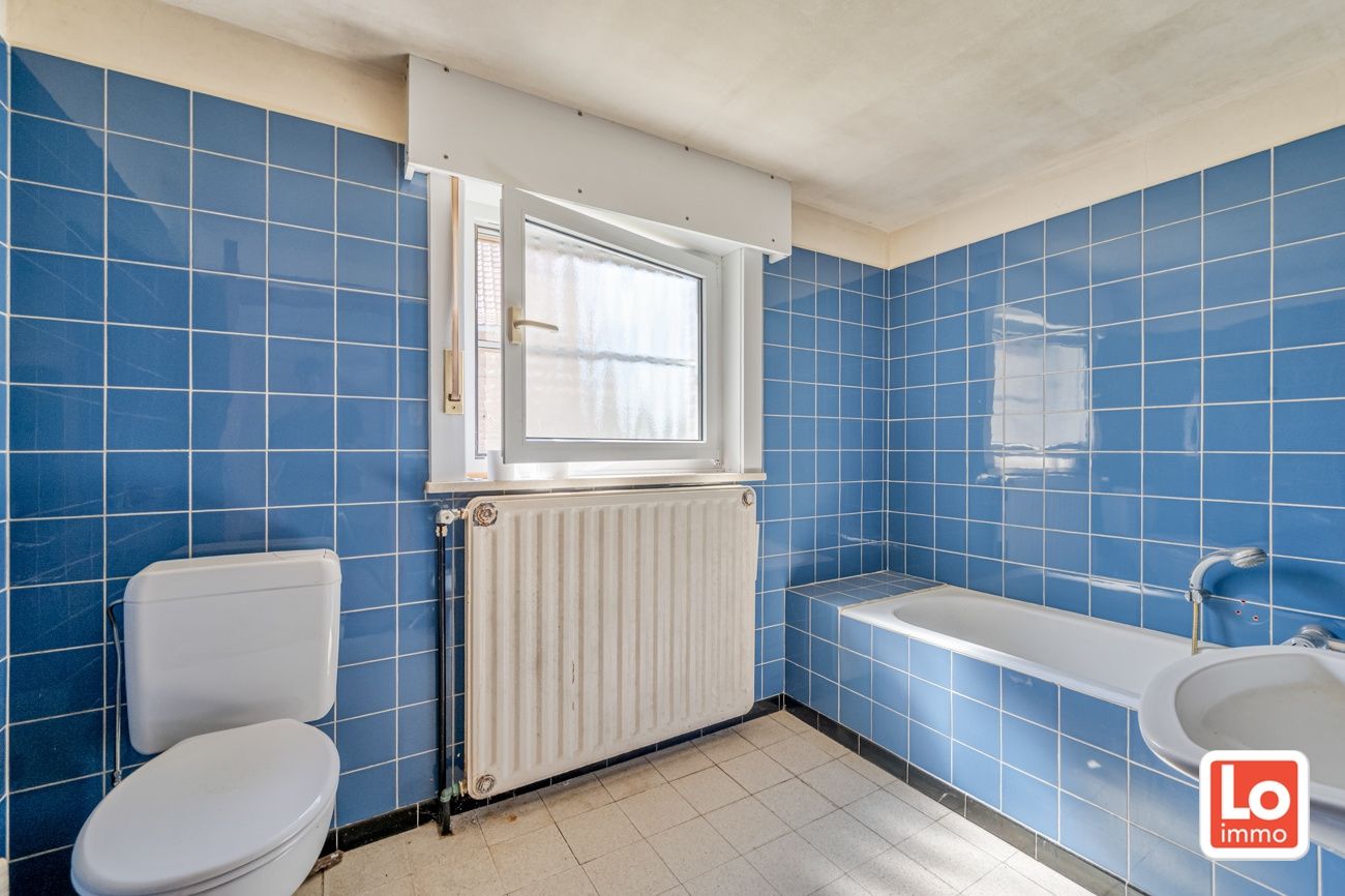 Statige open woning met ruim bijgebouw op groot perceel grond in het centrum van Kalken! foto 20
