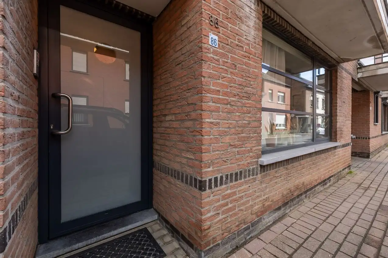 Gelijkvloers appartement met twee slaapkamers en autostaanplaats foto 22