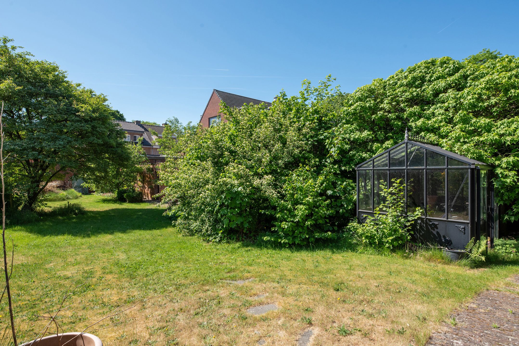 Uniek en imposant halfopen herenhuis met zuidtuin foto 29