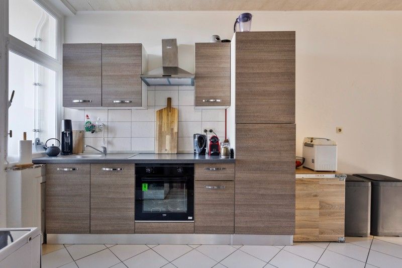 Ruim lichtrijk en karaktervol appartement dicht tegen het centrum foto 12