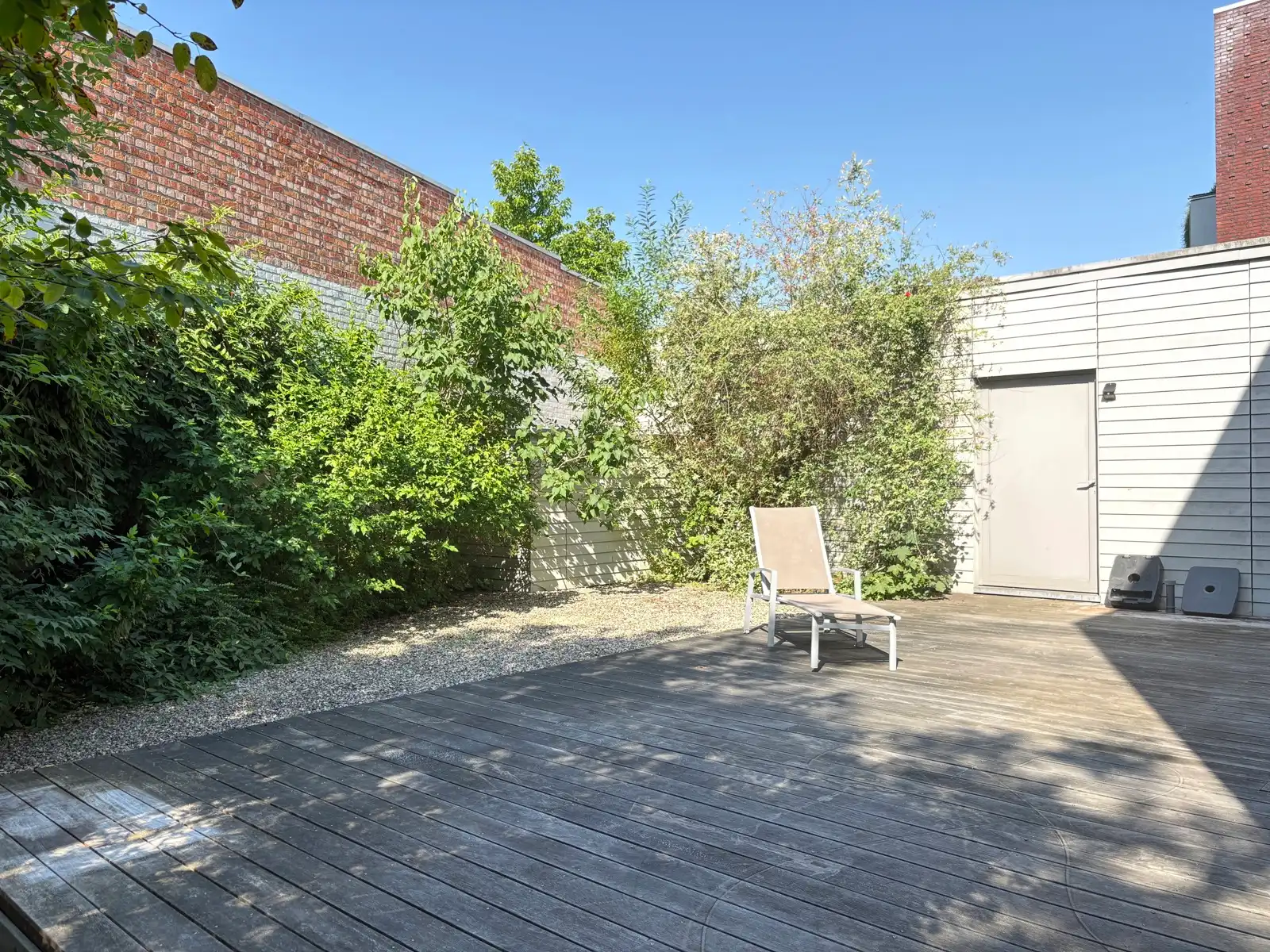 Moderne woning met ruime stadstuin foto 22