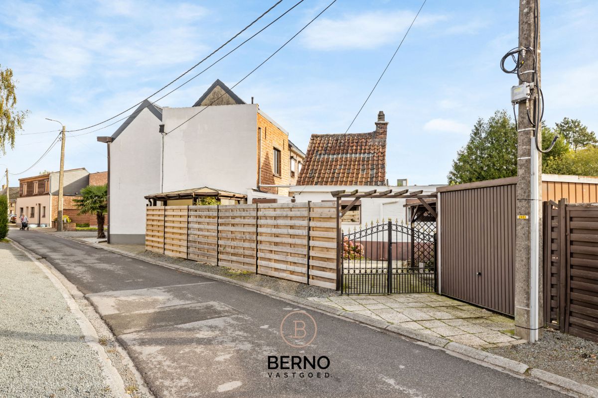 Centraal gelegen woning met tuin en garage. foto 16