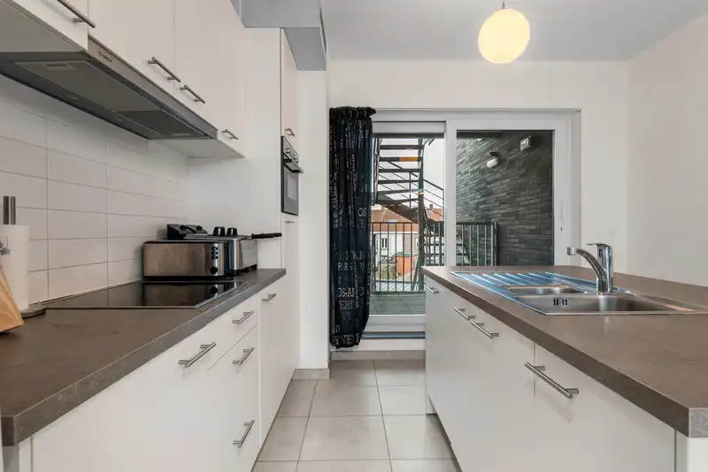 Nabij centrum Roeselare : recent  2 slaapkamers en twee terrassen in de Residentie El Palmar. Totale oppervlakte 138,43 m². foto 6