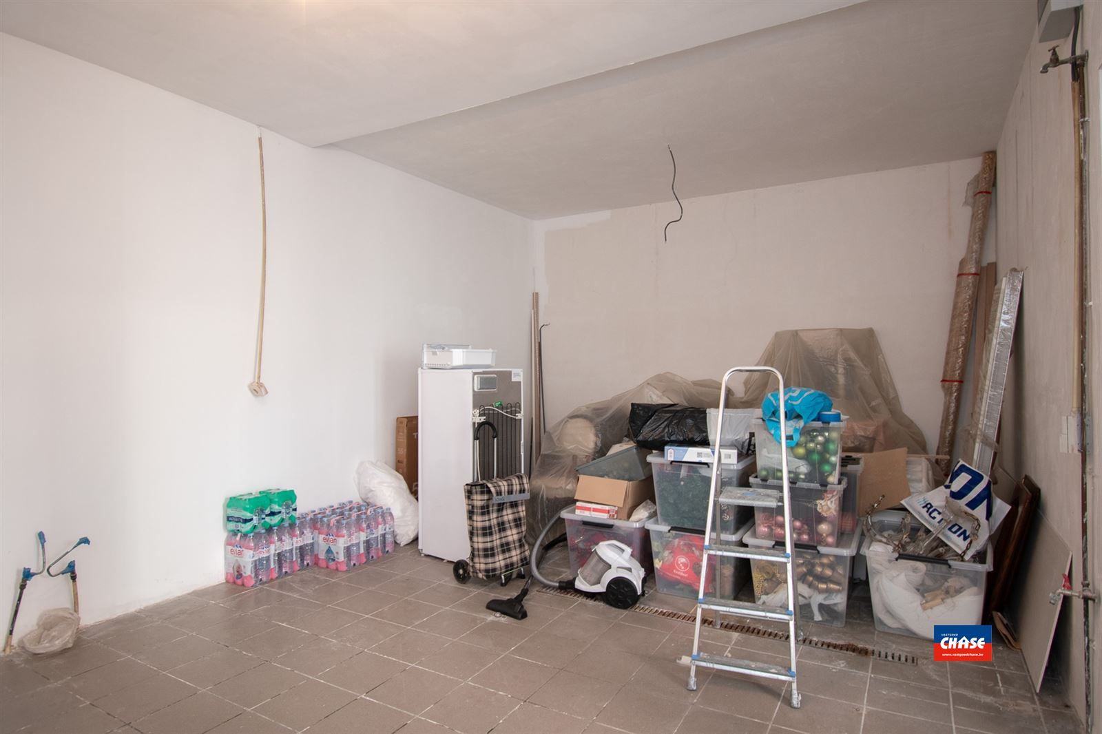 Twee gelijkvloersappartementen met grote koer en polyvalente ruimte foto 14
