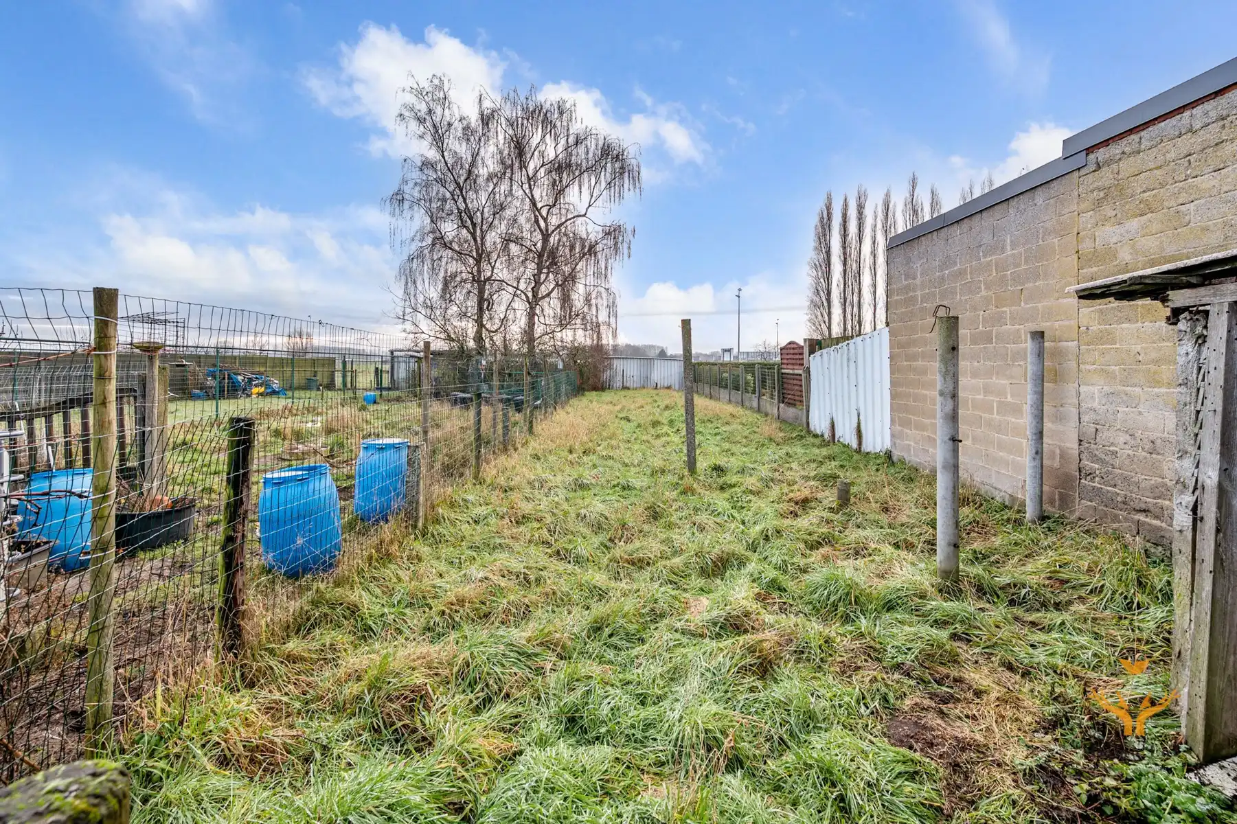 Ideale te renoveren starterswoning in hartje Berlare foto 3