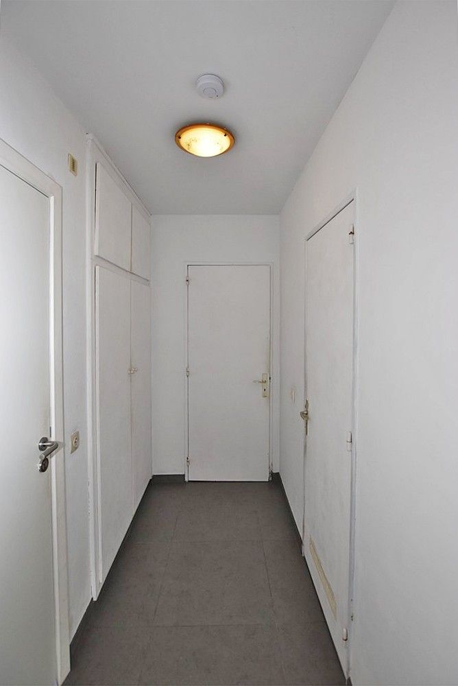Gelijkvloers appartement met terras op gunstige locatie te huur! foto 2