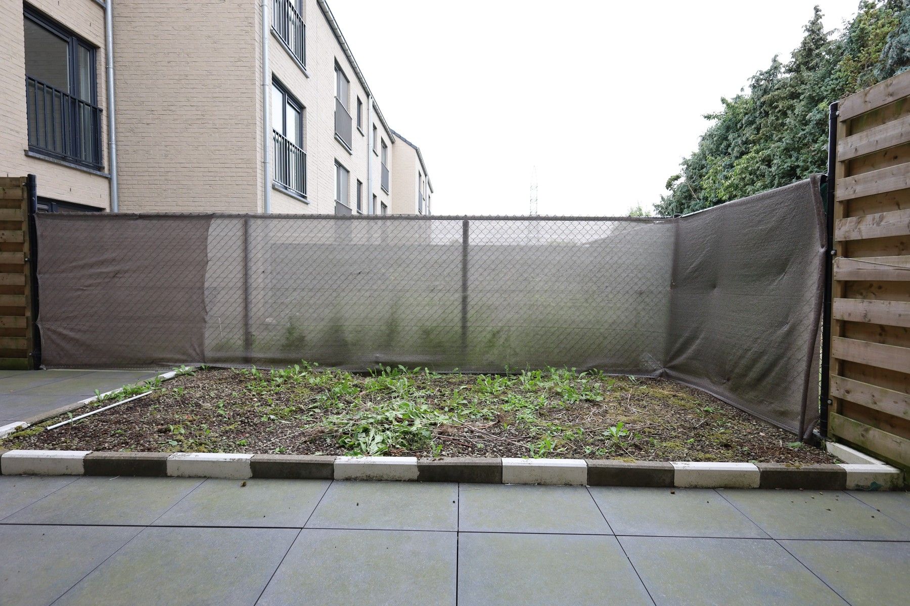 Gelijkvloers 1-slaapkamerappartement met groot terras/klein privétuintje foto 9