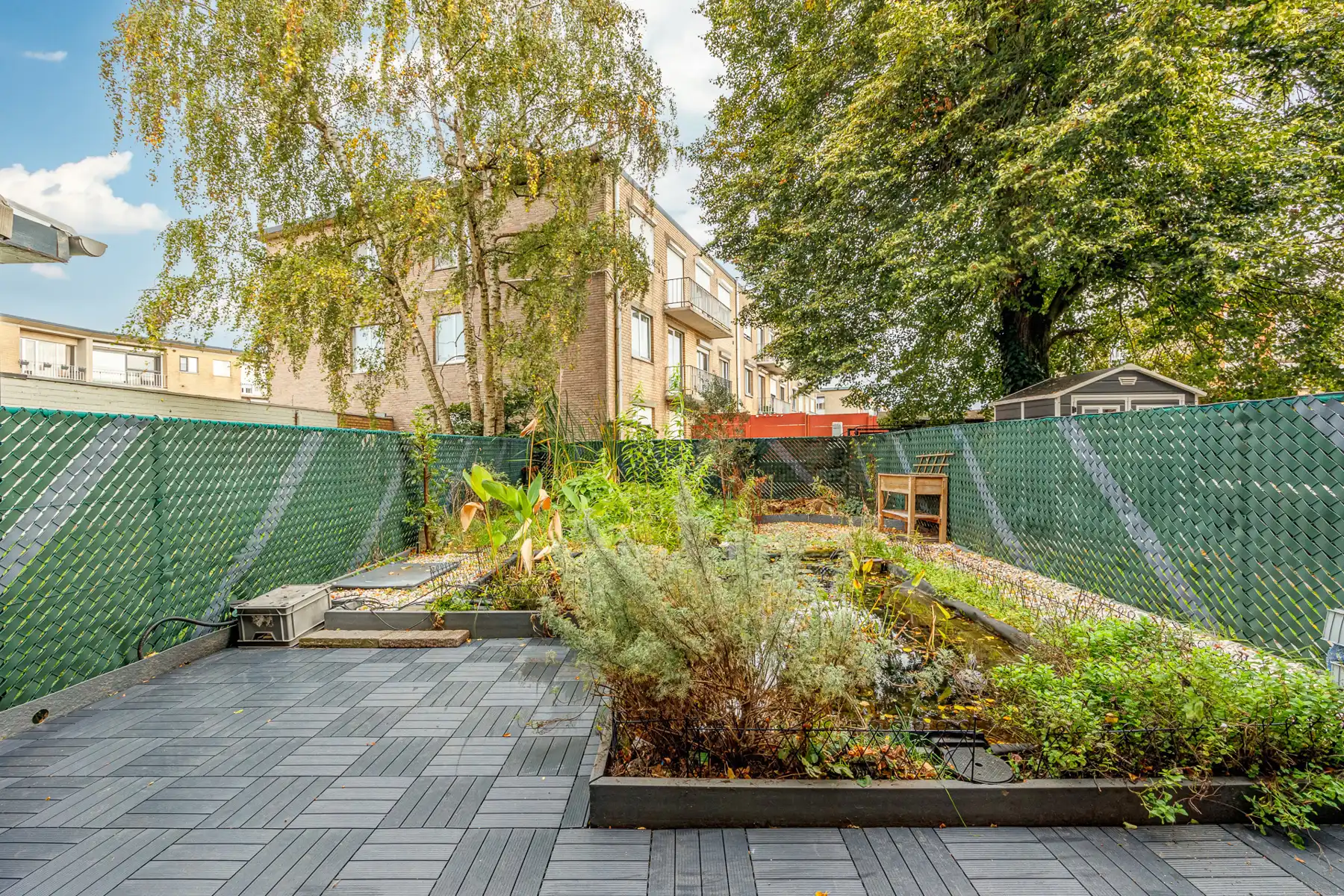 Gelijkvloersappartement met 2 slaapkamers, tuin en garagebox foto 13