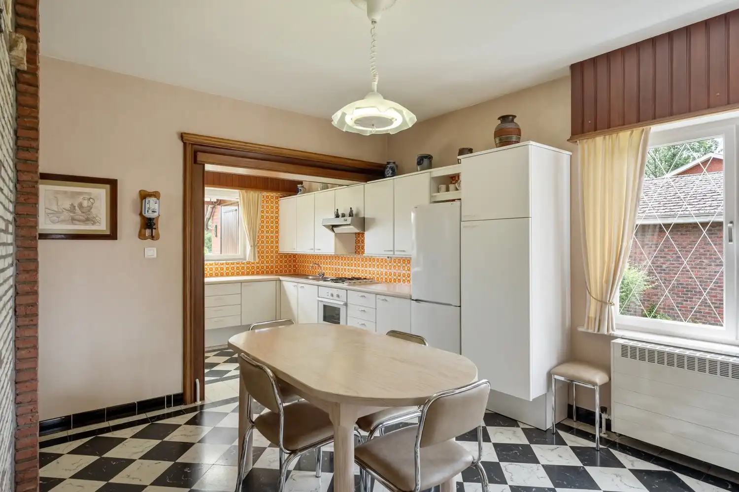 Te renoveren woning met 3 slaapkamers (en afgewerkte zolderkamer) op een perceel van 7 are 5 centiare te Gelrode. foto 8