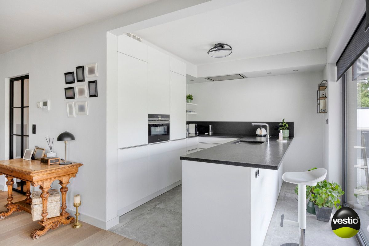 PRACHTIG APPARTEMENT VAN 90M² MET 2 SLK AAN STADSRAND BILZEN. foto 11