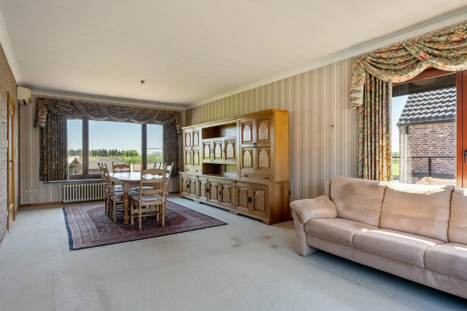 Gelijkvloerse gezinswoning op een ruim perceel van 9a51ca op een rustige locatie met uitzicht op achterliggende weilanden!  foto 8