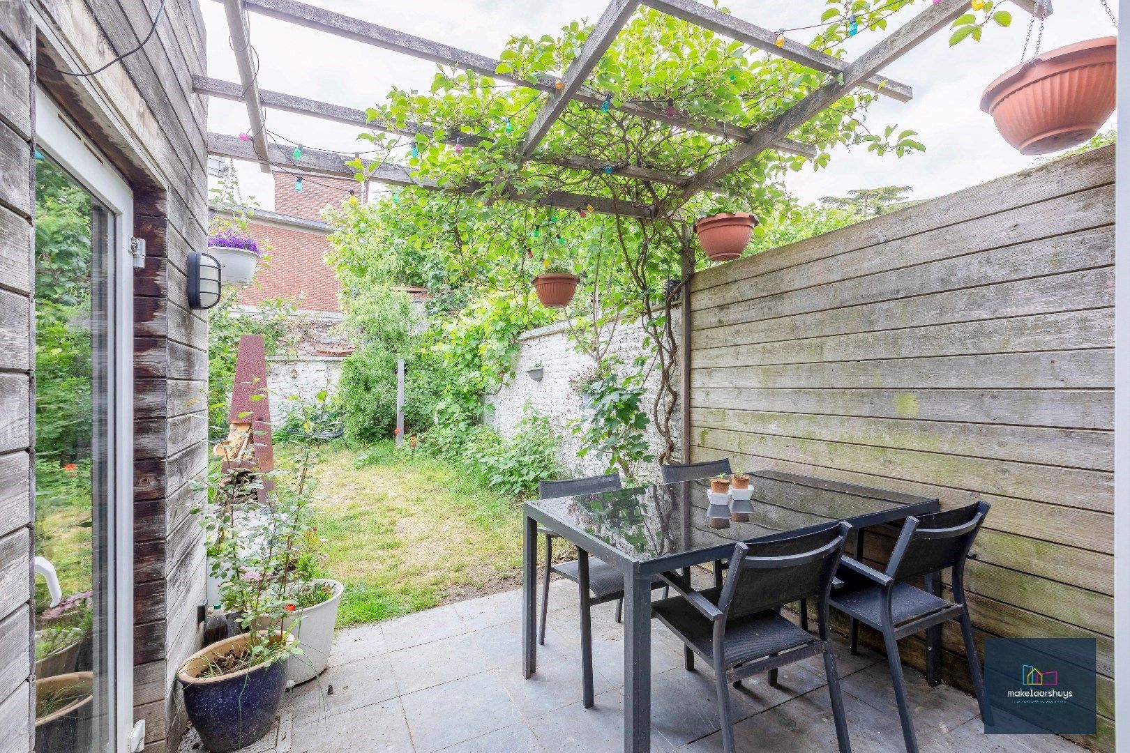 Instapklare woning met aangename tuin en garage foto 20