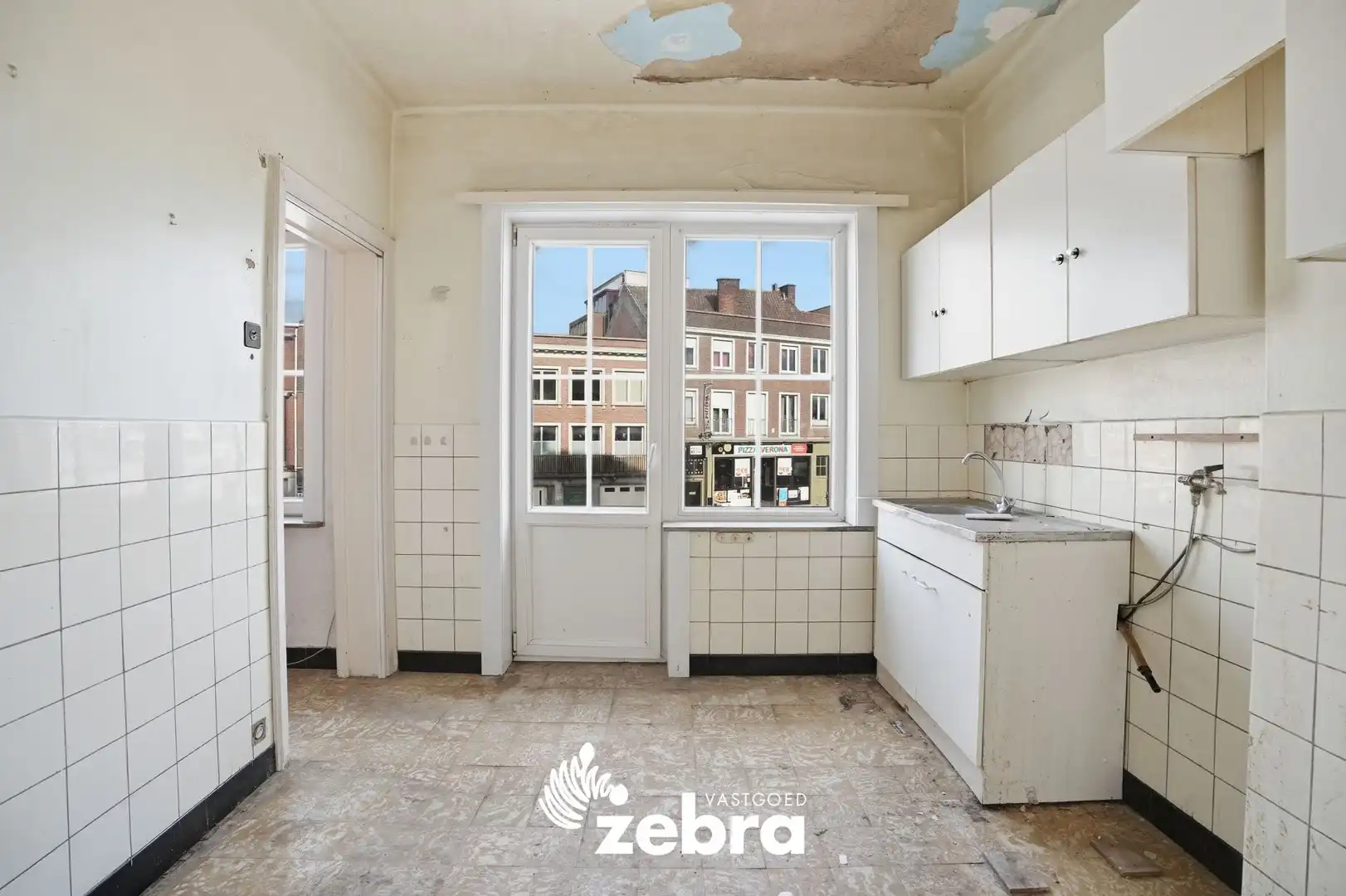 Te renoveren appartement op centrale ligging in Kortrijk! foto 9