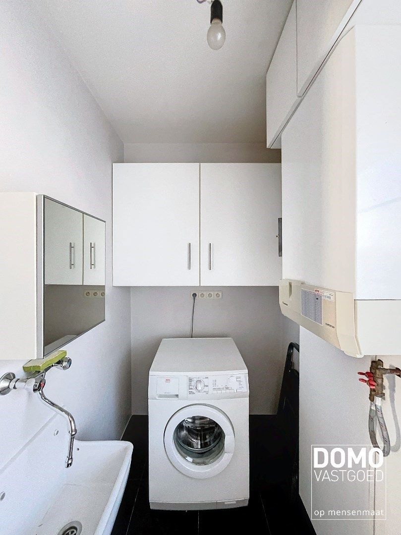 Duplex appartement met een gezellig tuintje, ondergrondse autostandplaats en 2 slaapkamers te Spalbeek - energielabel B, 109m² bewoonbare oppervlakte foto 11