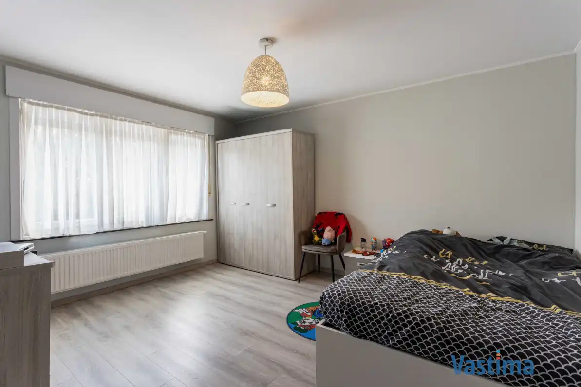 Instapklare gezinswoning met 2 staanplaatsen, zonnige tuin en parkzicht foto 16
