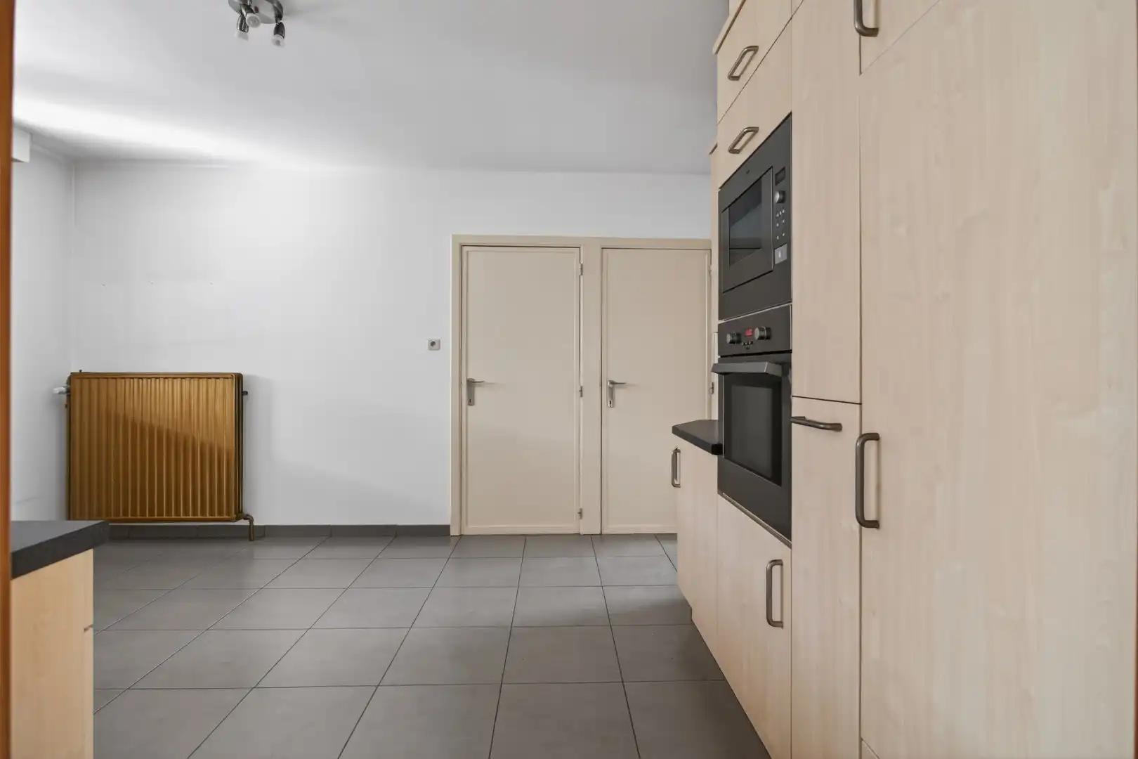 Ruime gelijkvloerse woning met veel potentieel op rustige ligging in Mol foto 18