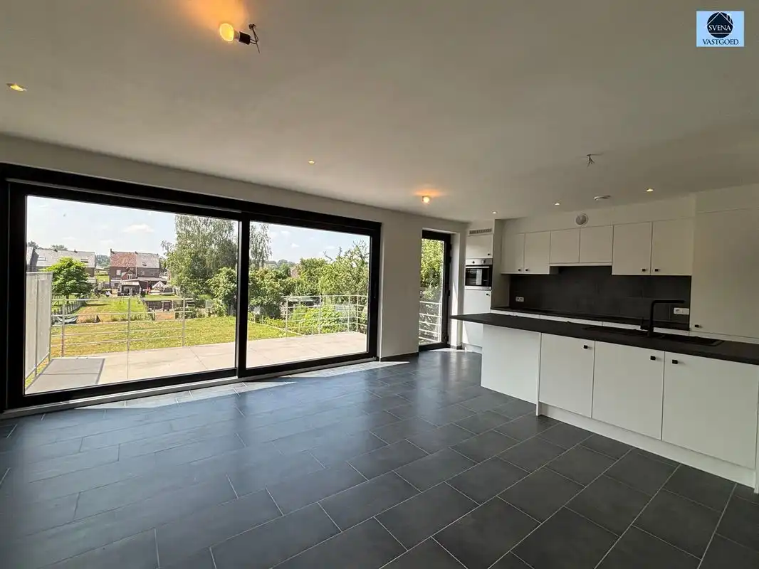 INSTAPKLARE BEN-WONING MET KELDER, GARAGE EN ZONNIGE TUIN IN ASPELARE foto 3