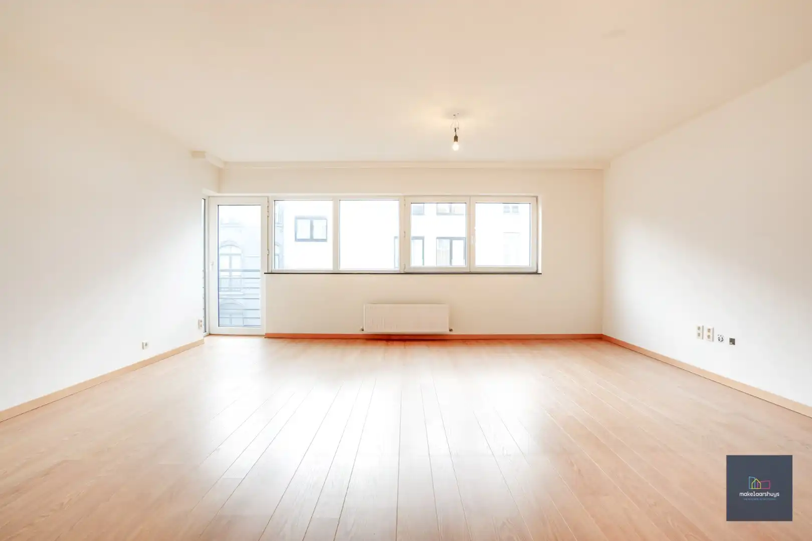 Goedgelegen 2slpk-appartement met terras en staanplaats foto 4