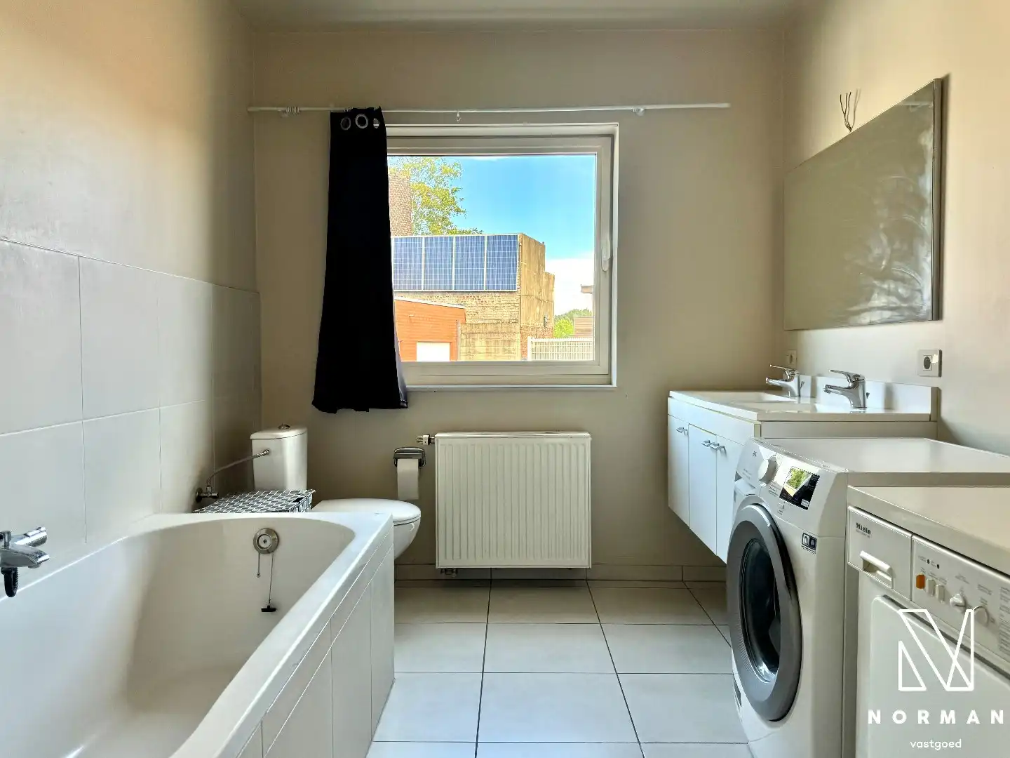 Gelijkvloers, instapklaar 2-slaapkamer appartement te koop met terras in centrum Bavikhove! foto 17