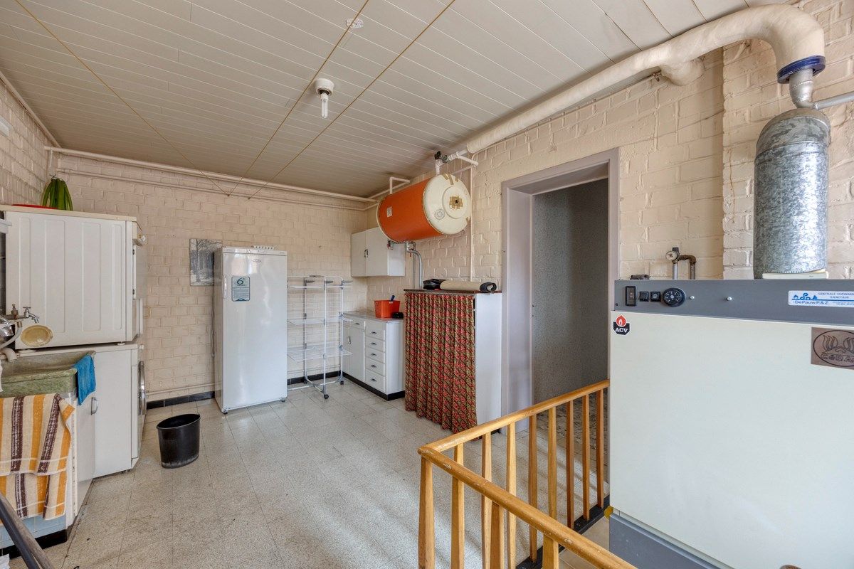 Ruime woning met tuin en 6 slaapkamers foto 22