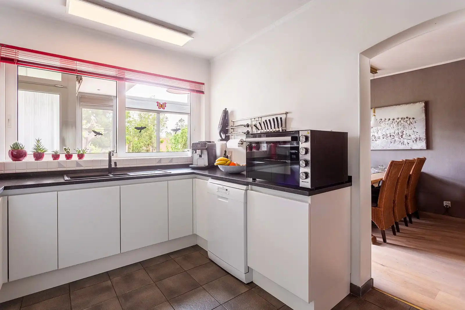 Instapklare bel-etagewoning met 3 slaapkamers en groene tuin foto 33