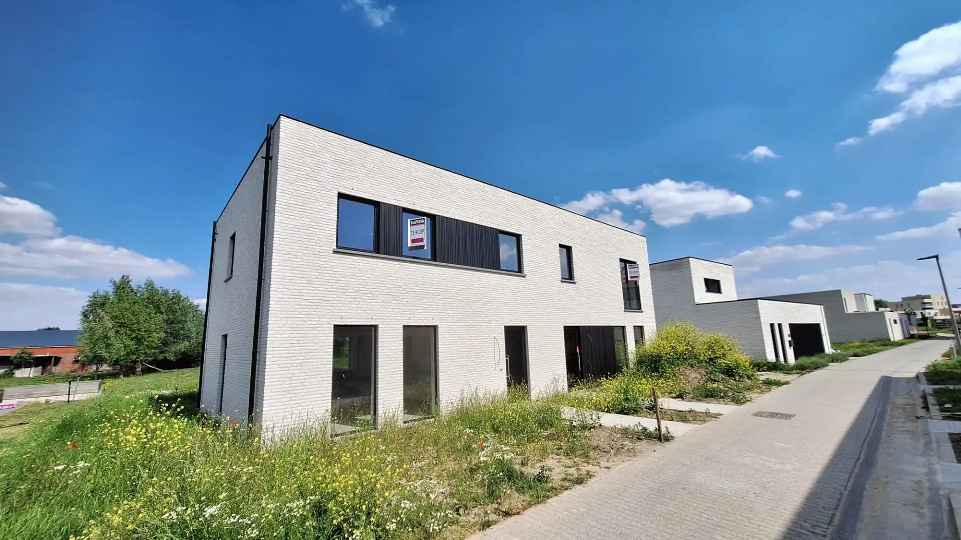 Nieuwbouwwoningen in De Vloei te Ieper foto {{pictureIndex}}