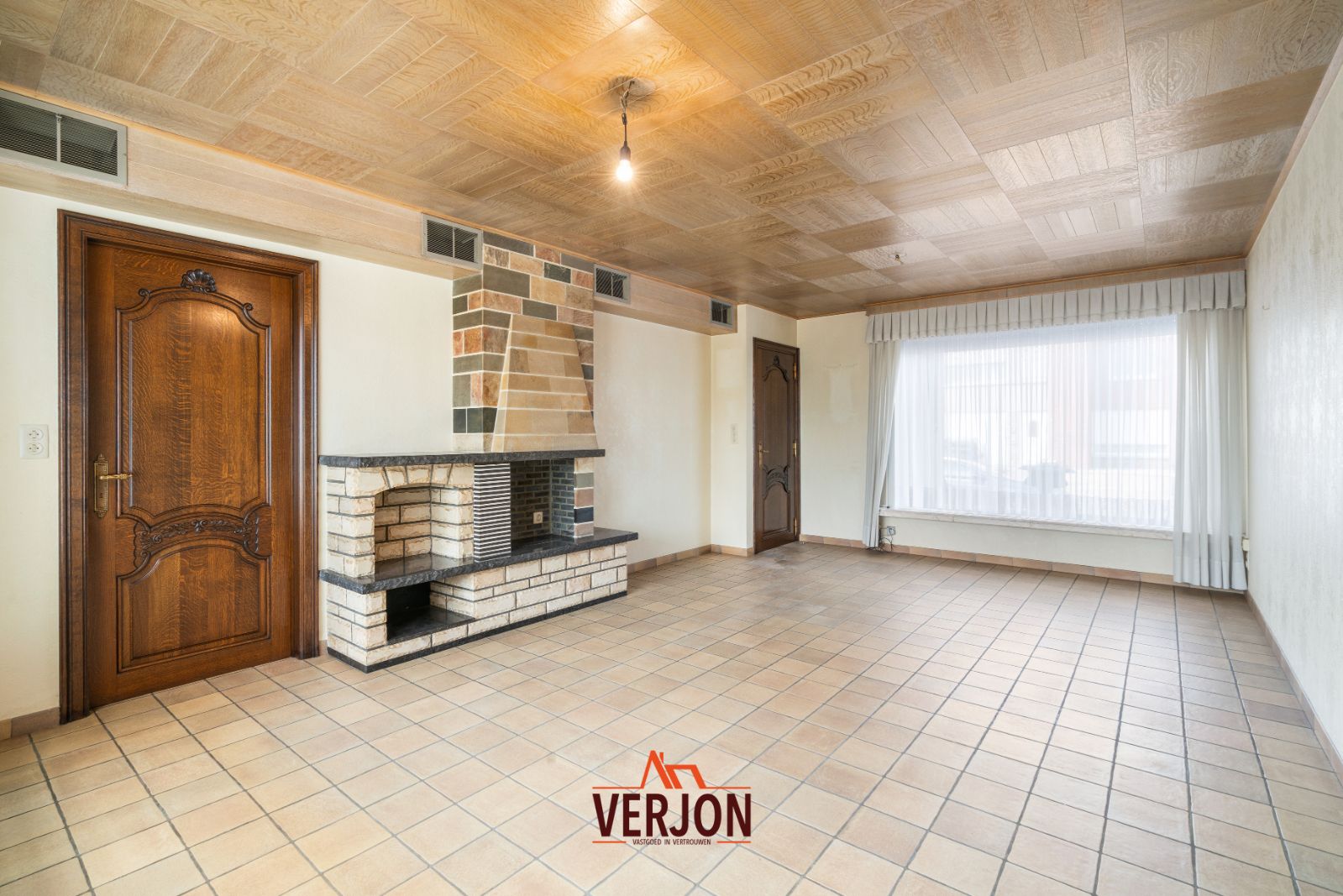 Woning met zuidgerichte tuin te koop in Kachtem! foto 2