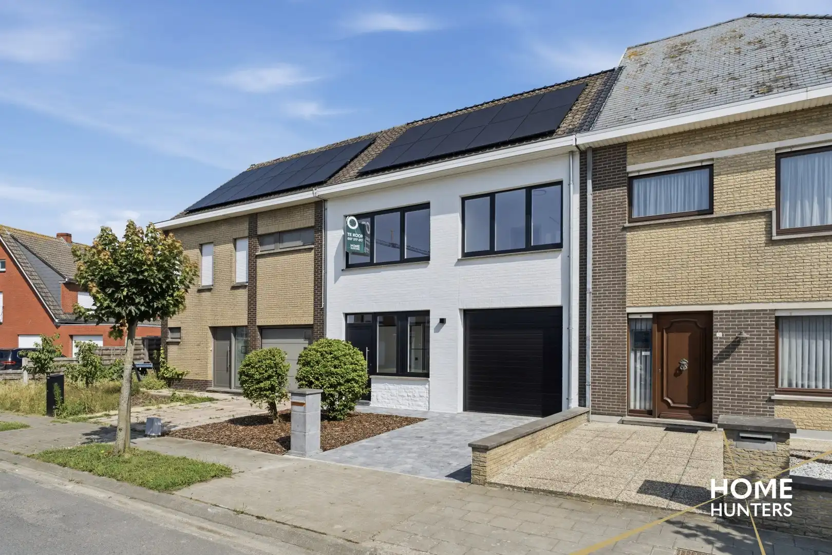 Volledig gerenoveerde woning met 3 slaapkamers, garage, ruime oprit en zonnige tuin in een rustige buurt van Ieper foto 35