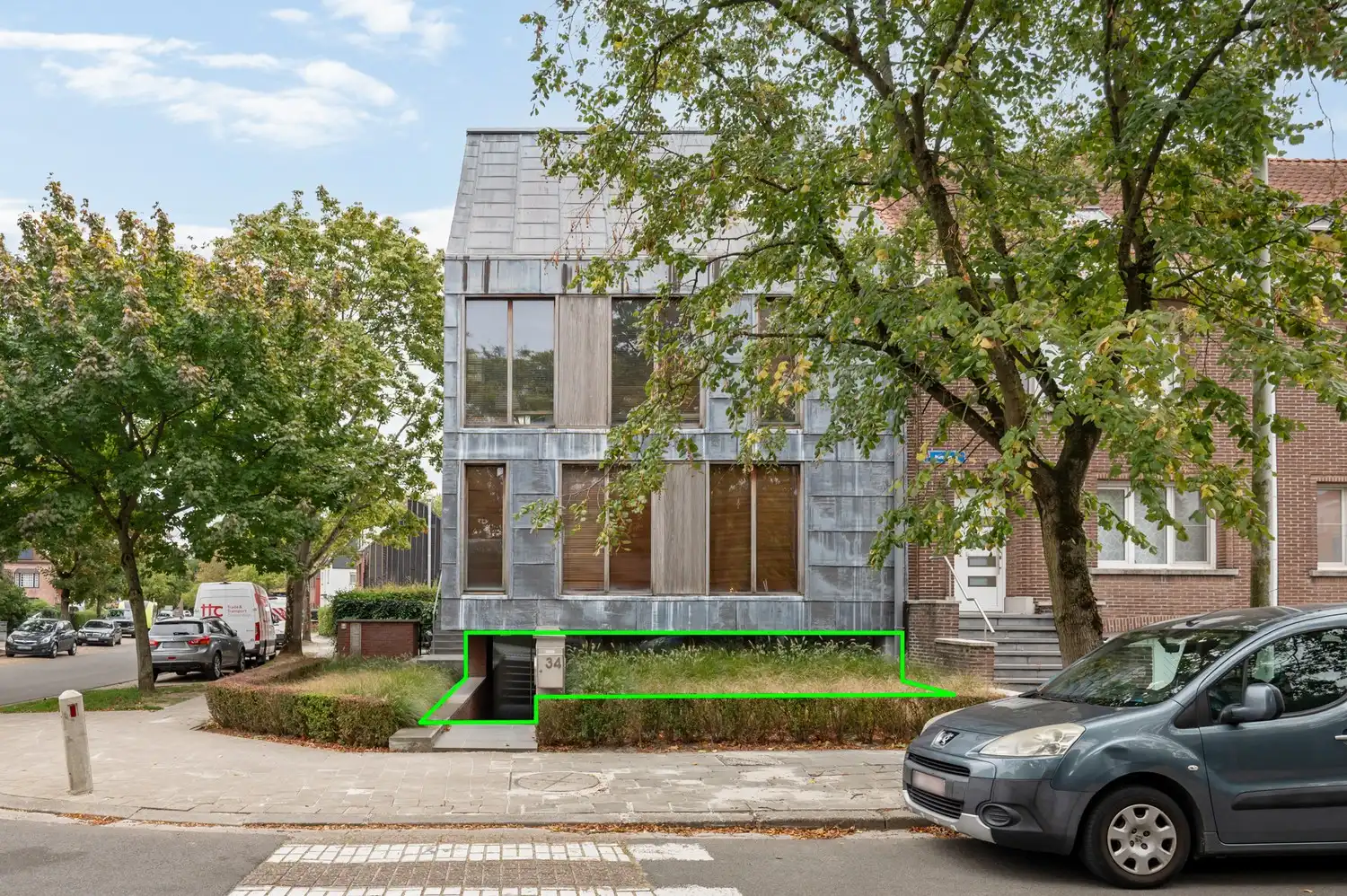 Gelijkvloers 2-slaapkamerappartement met tuin en garagebox foto 17