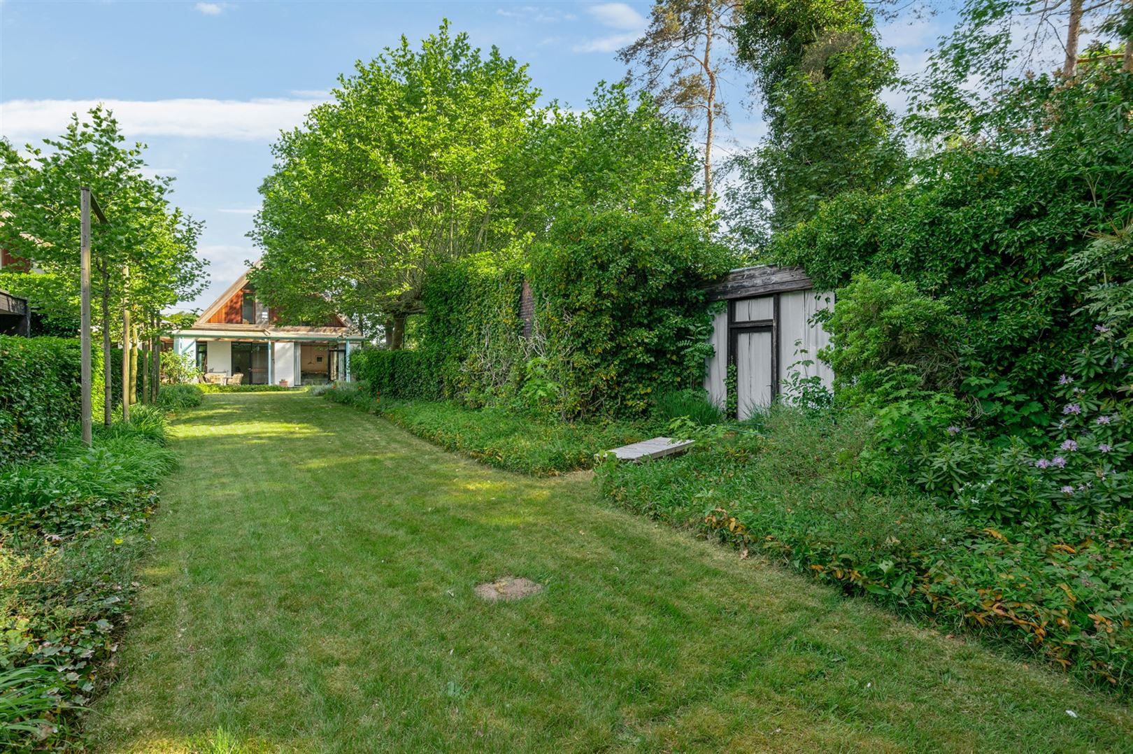 Te renoveren woning met grote tuin en garages in landelijke omgeving foto 5