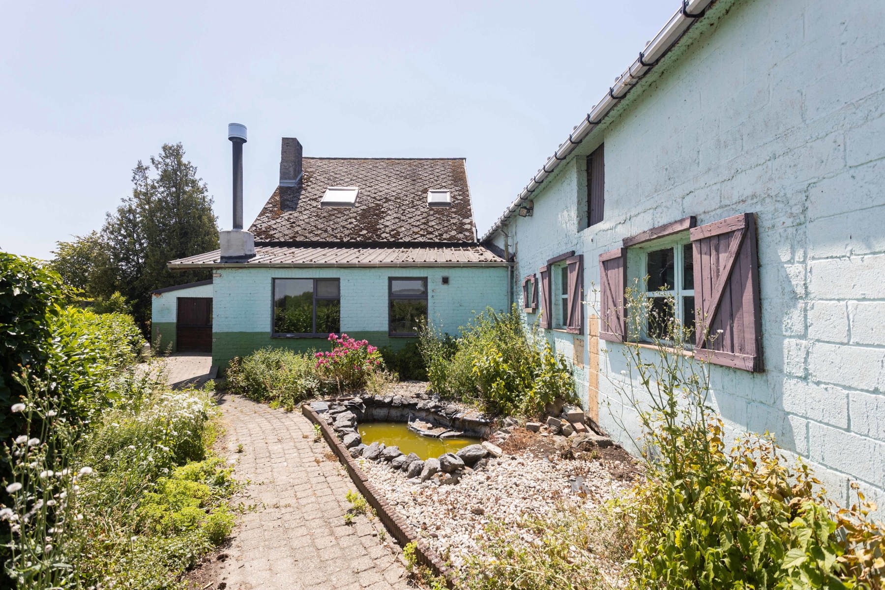 Te renoveren woning met grote tuin en atelier op toplocatie! foto 36