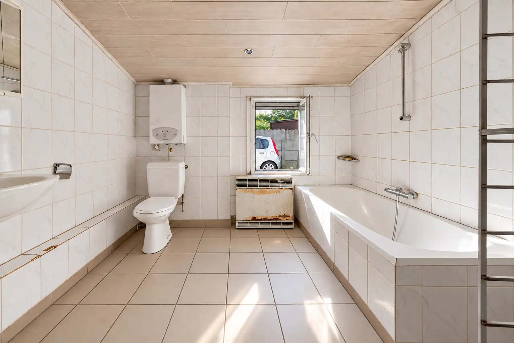 Halfopen bebouwing met potentieel op toplocatie in Lokeren foto 4