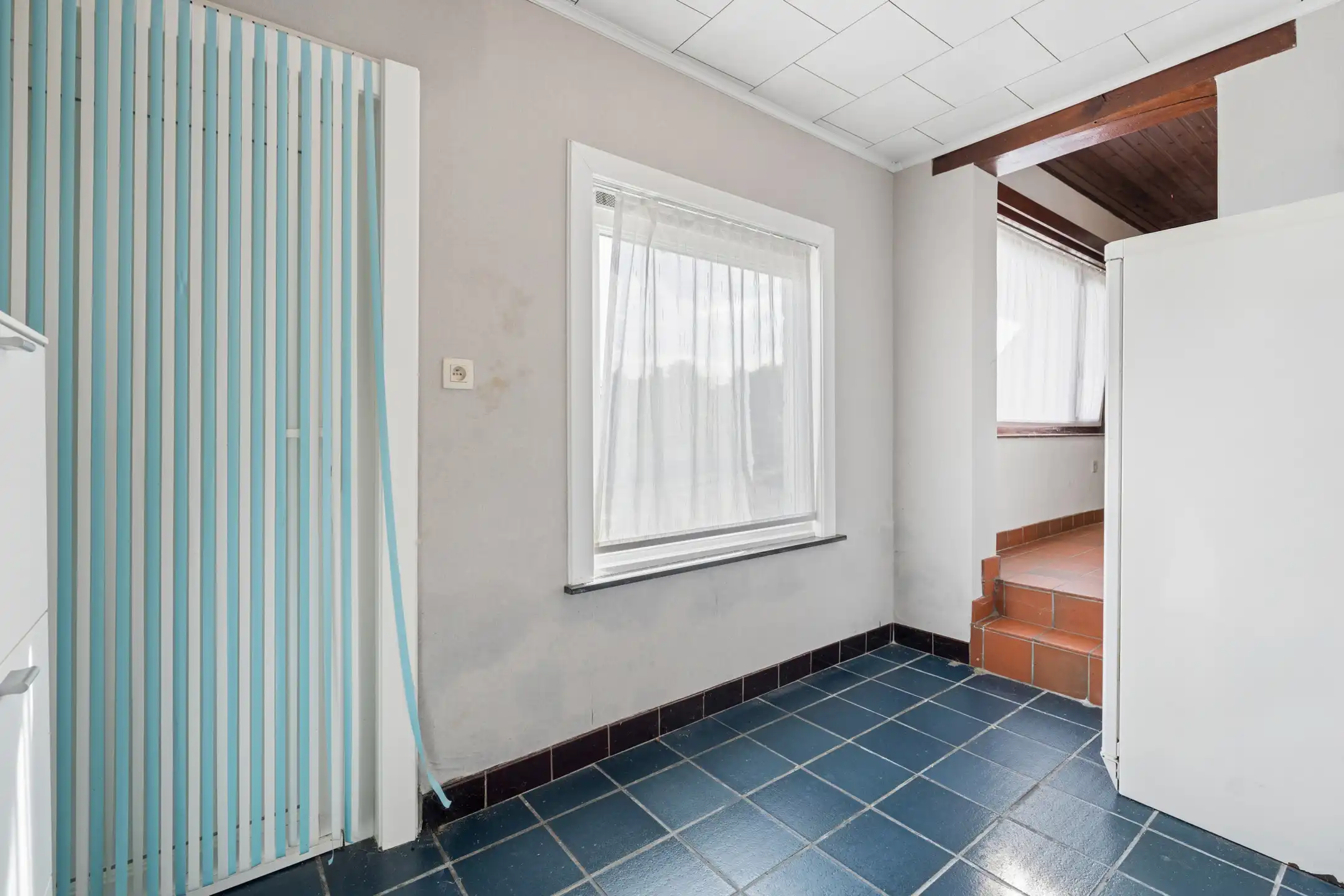 Charmante 3-gevelwoning met garage en tuin foto 12