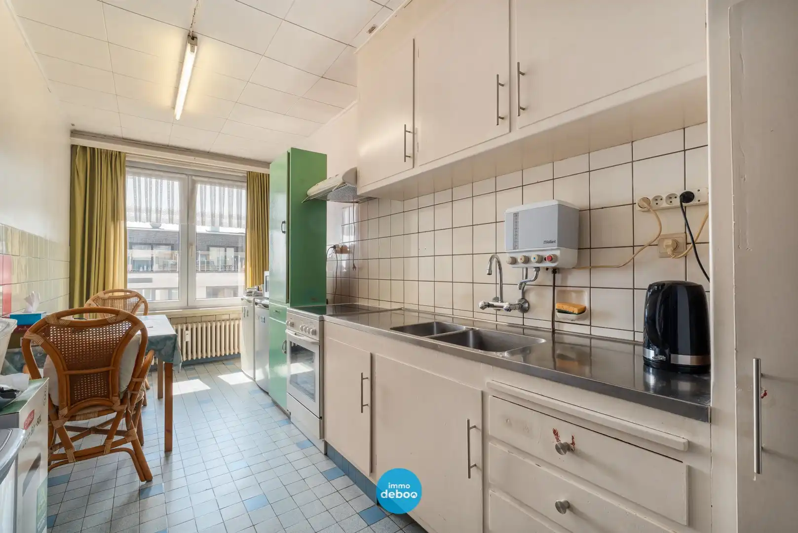 Op te frissen appartement met terras op de 7de verdieping foto 7