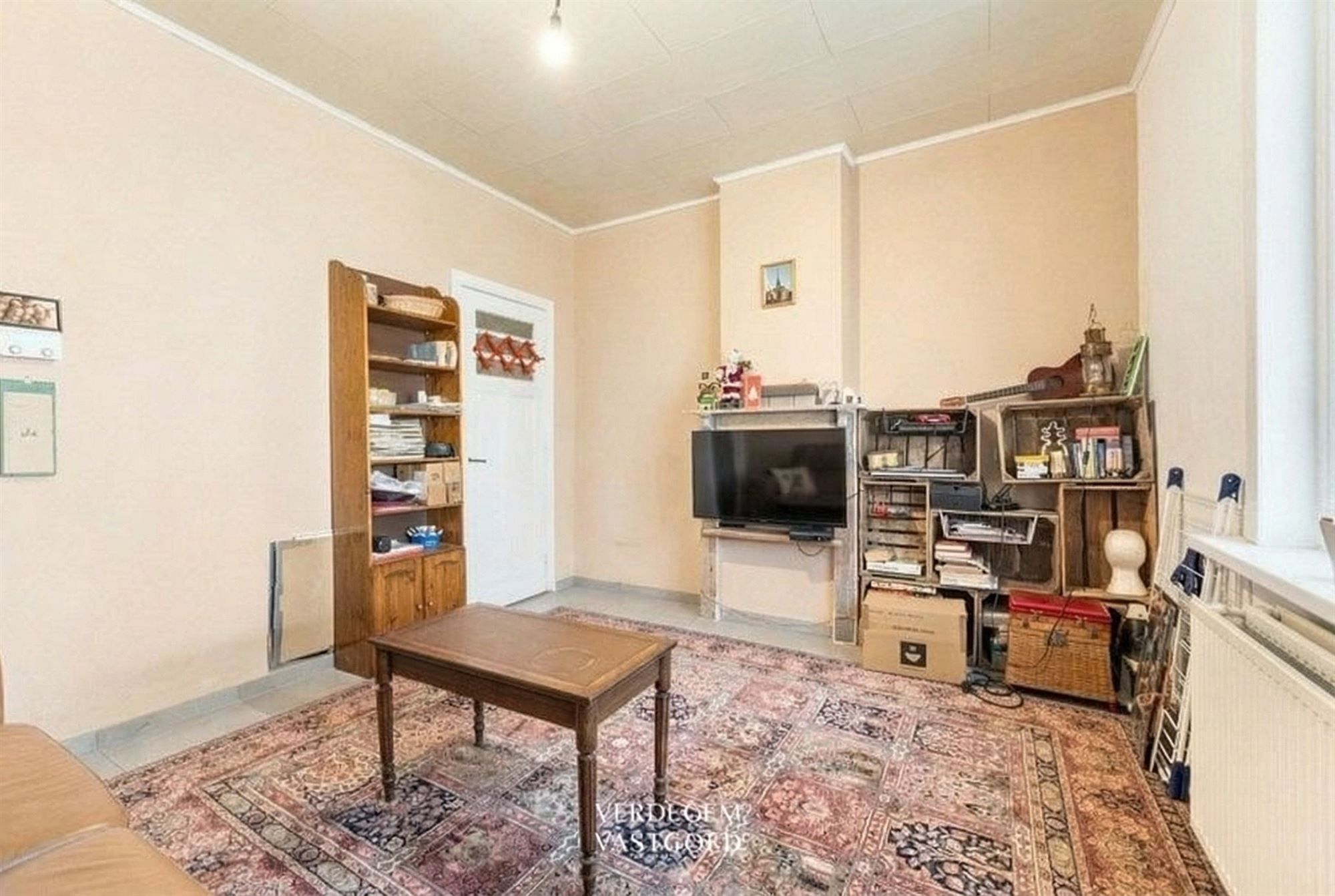 Centraal gelegen woning met 2 slaapkamers, garage en tuin foto 4