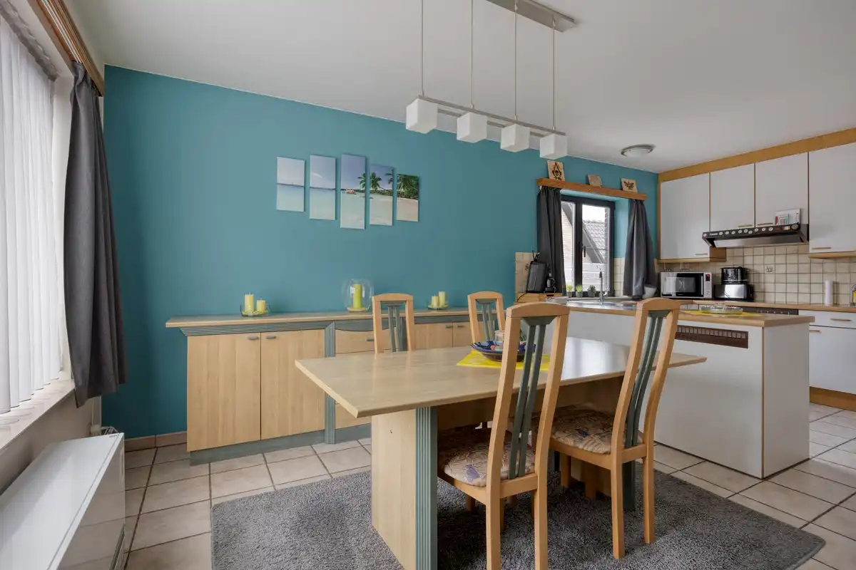 Opbrengsteigendom met 3 appartementen en 7 garages foto 22