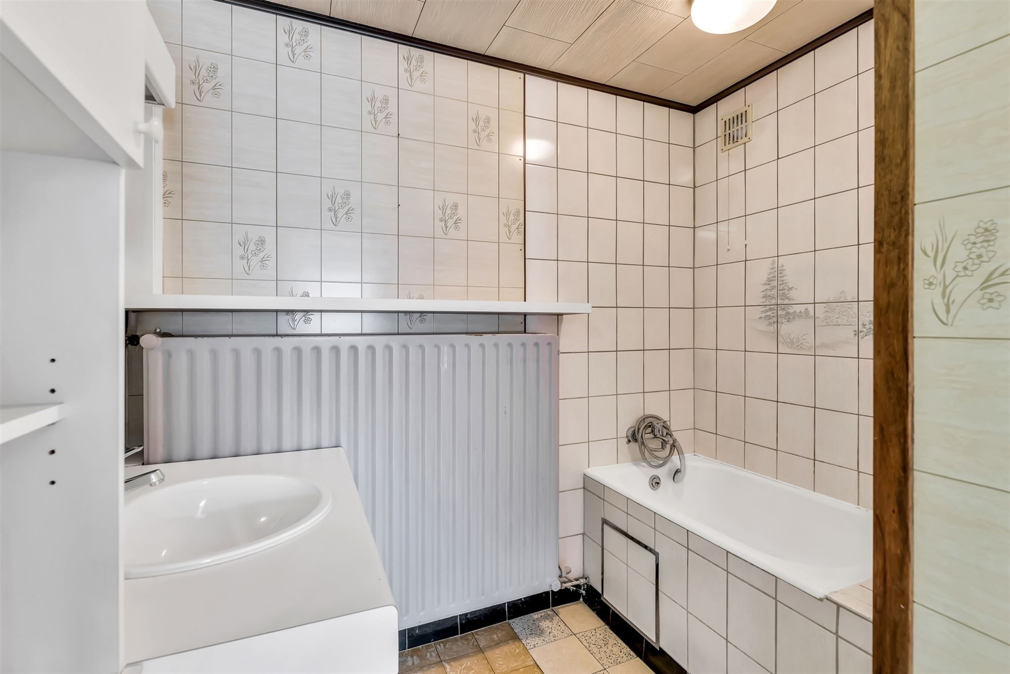 GEZELLIGE WONING MET 3 SLAAPKAMERS EN RUIME TUIN IN BERINGEN CENTRUM foto 10