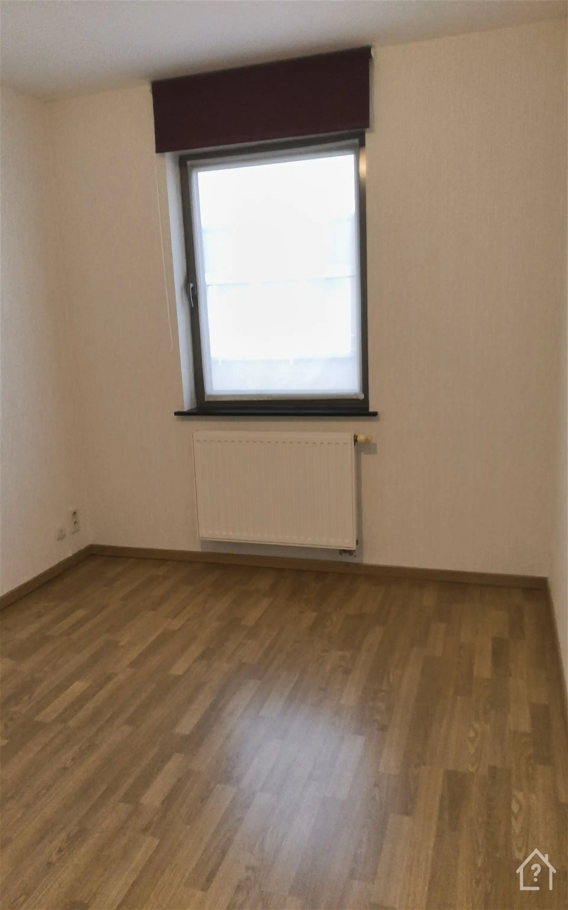 Ruim 2 slaapkamer-appartement met garage foto 19