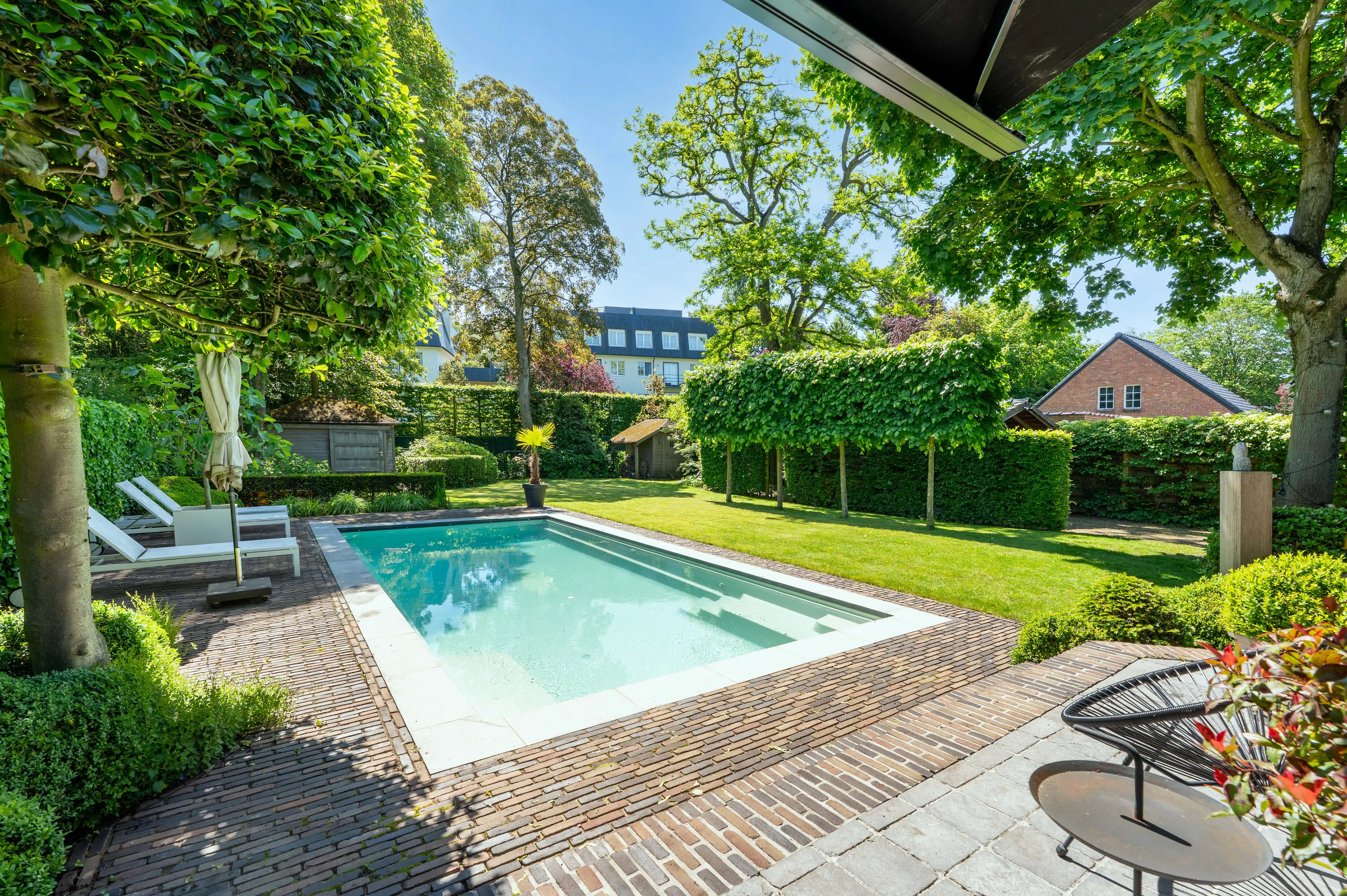 Karaktervolle herenwoning met verwarmd zwembad in hartje Kapellen. foto 25