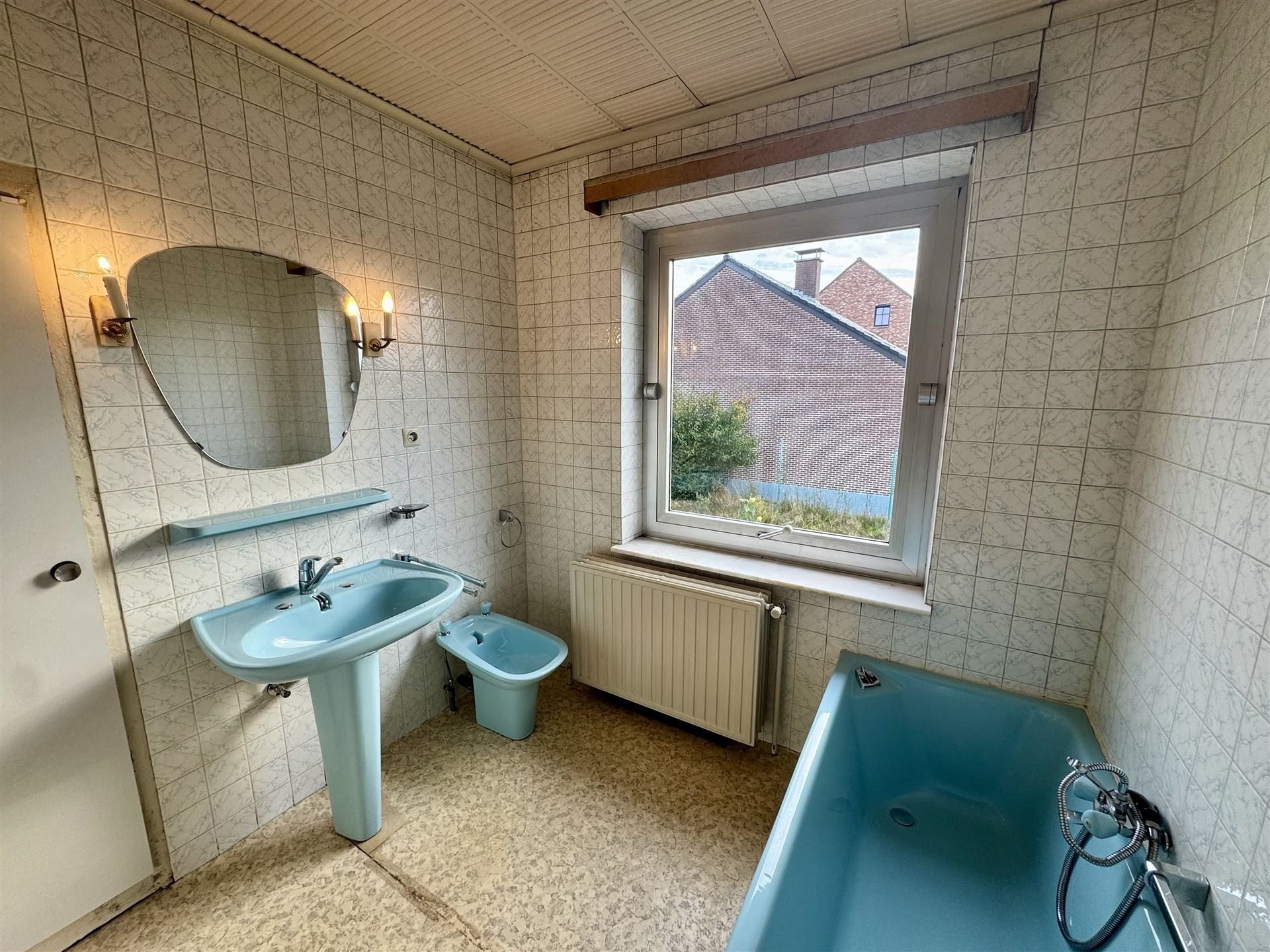 Vrijstaande splitlevelwoning met tuin te Meeswijk. foto 10
