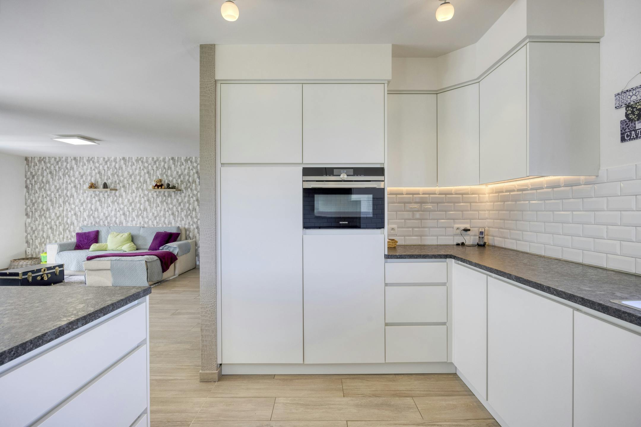 Riante zorgwoning/kangoeroewoning met loods te koop foto 26