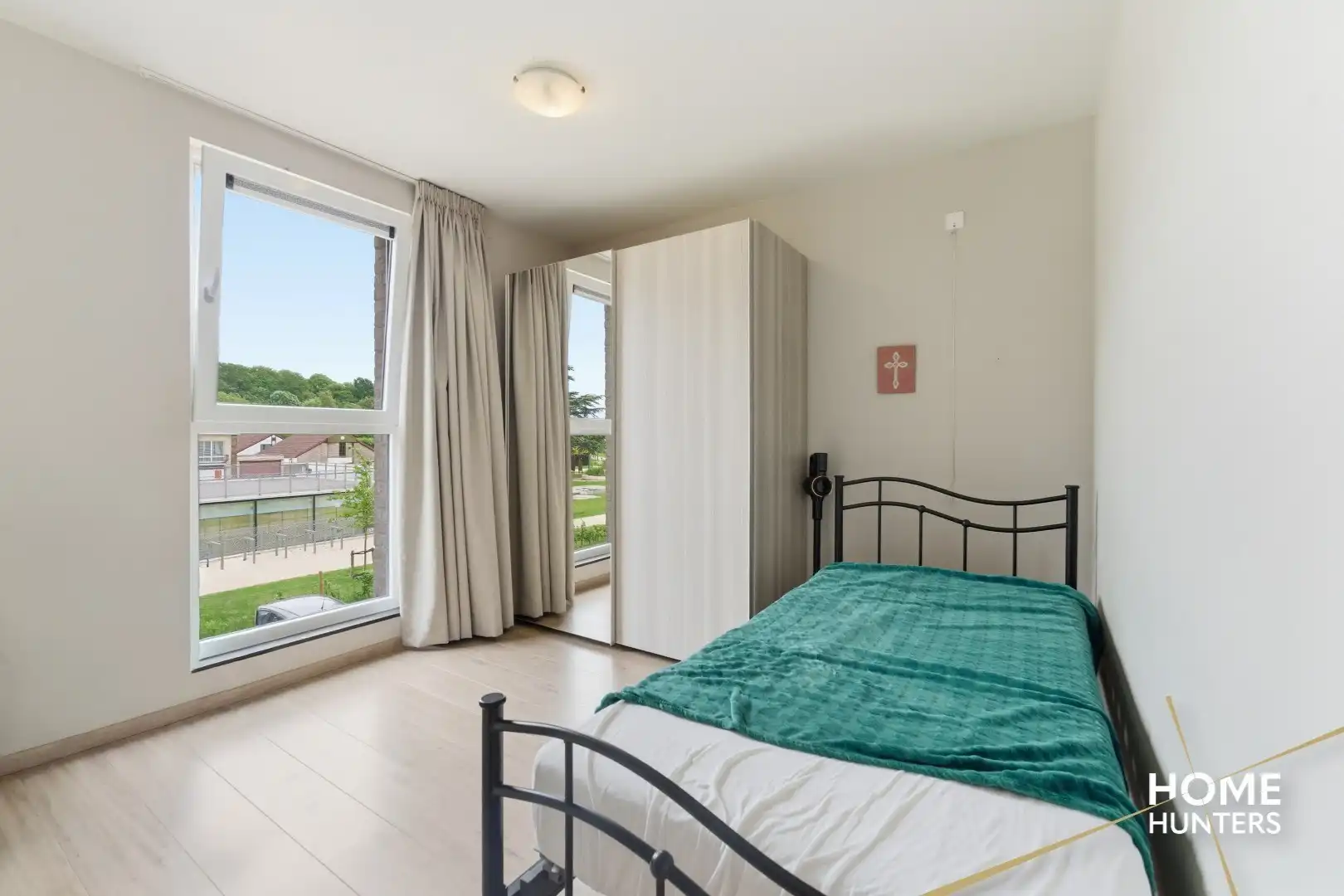 Gezellig appartement met 2 slaapkamers en terras op markt van Houthulst! foto 10