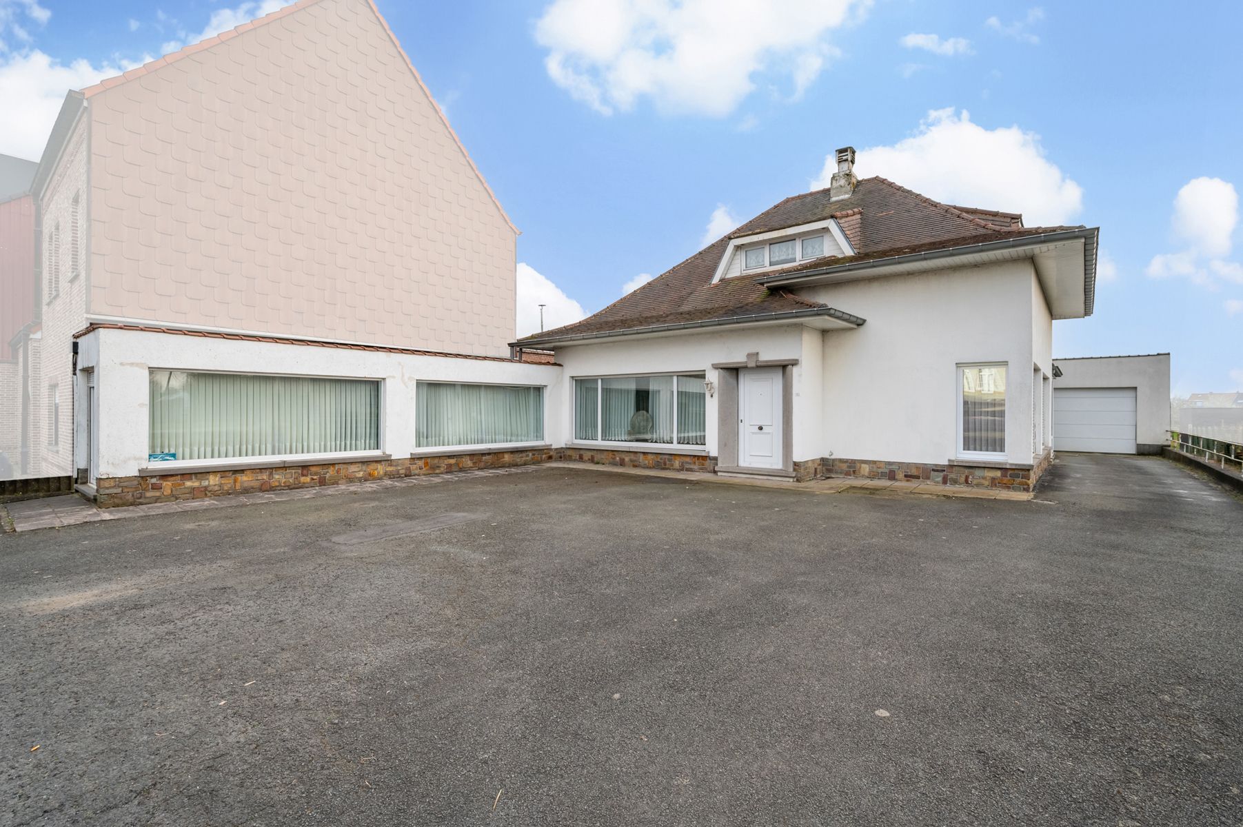 Ruime (handels) woning met groot werkhuis, tuin en garage foto {{pictureIndex}}