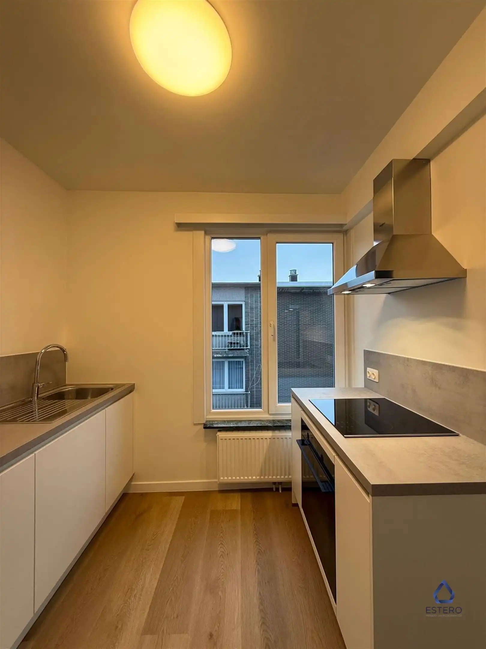 Gerenoveerd 2 slaapkamer appartement in Zellik foto 5