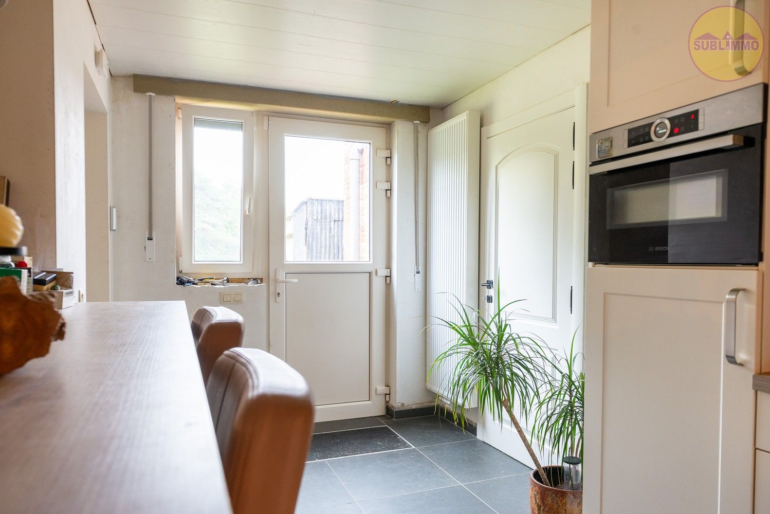 Half open bebouwing op een perceel van 865 m² in Tessenderlo-Ham. foto 4
