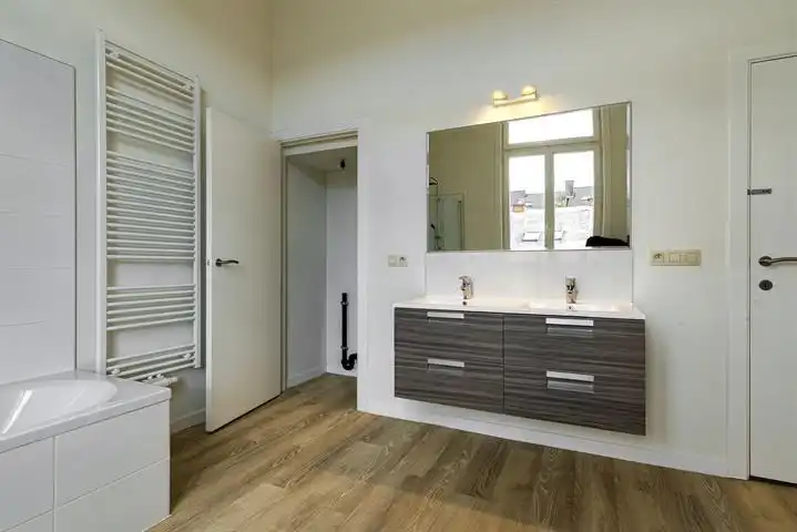 Wonen aan de voet van het station te Berchem foto 12