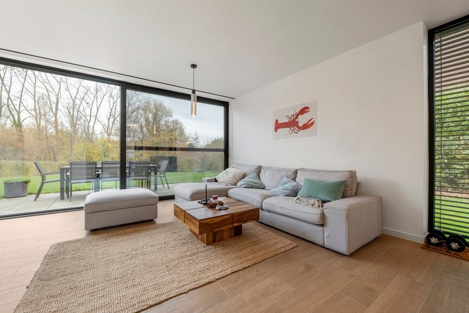 MODERNE HALFOPEN BEBOUWING MET INPANDIGE GARAGE EN RUIME TUIN IN SINT-TRUIDEN foto 11